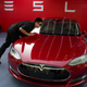 Tesla was aiming to post a profit by Q3.